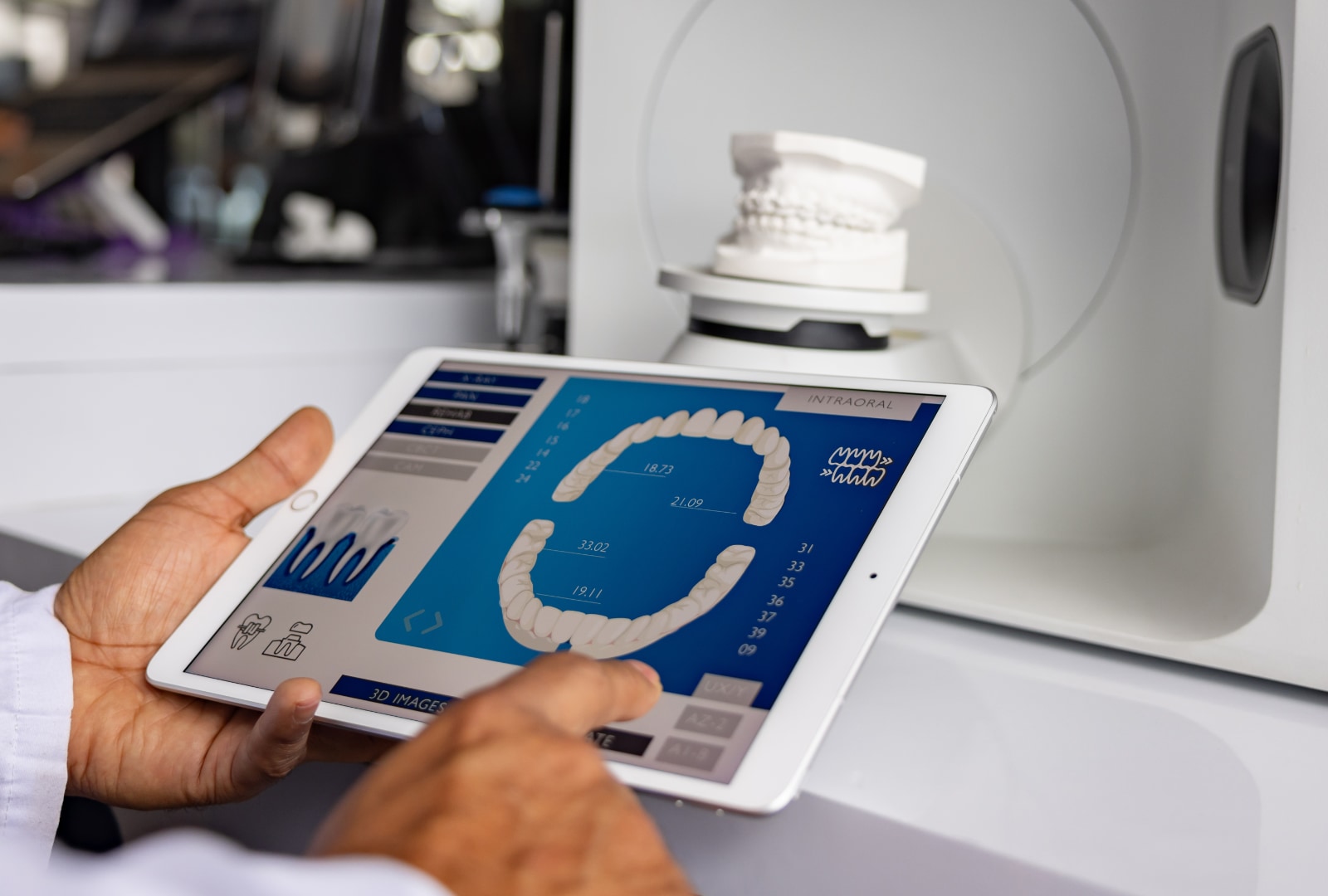 A tablet displaying dental care software.